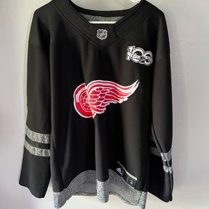 Red Wings jersey.